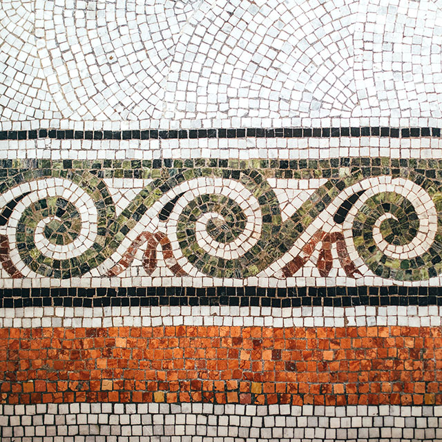 Hand made mosaic tiles in the entrance hall of St Marys University College