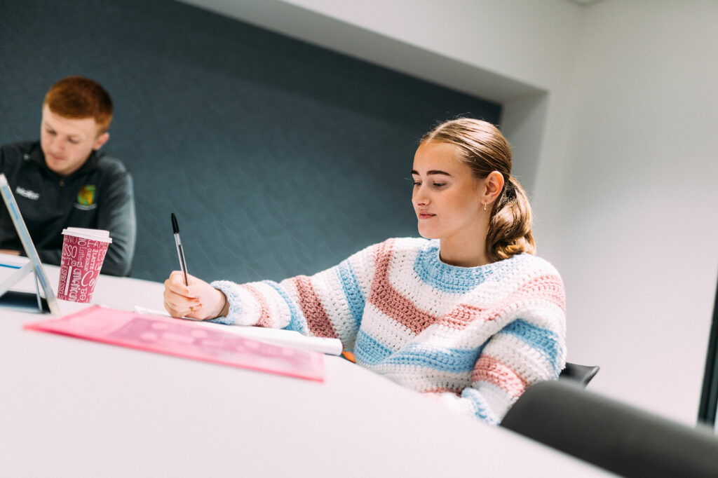 English Studies students using one of the study areas in the Cardinal Newman library