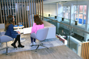 2 BA students chatting in the Careers reception